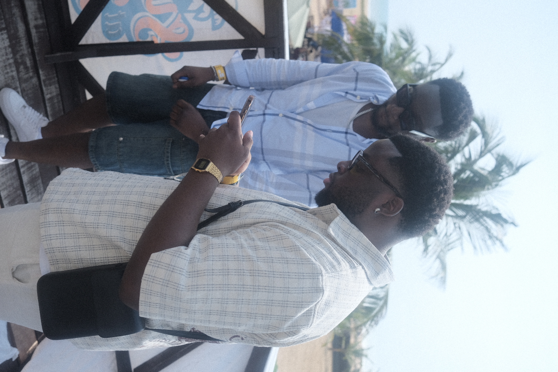 IJGB Connect Detty December — friends relaxing at the beach event in Lagos