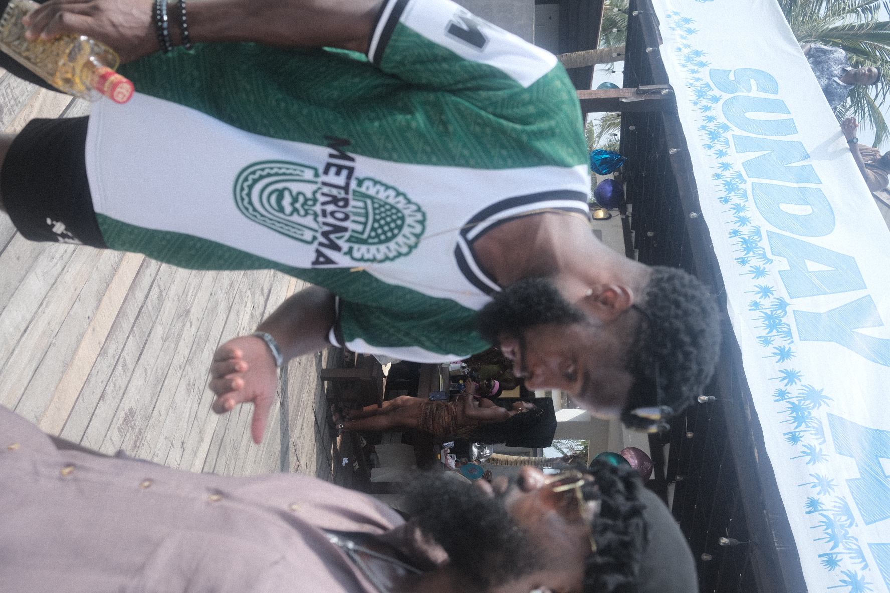 IJGB Connect Detty December — guest in a Metroma jersey enjoying the day party